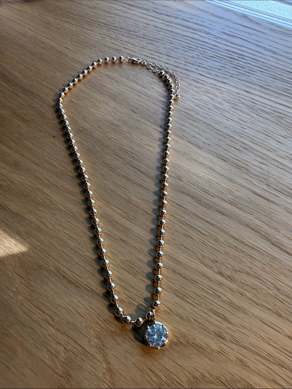 Lili Claspe Cleo gold Beaded Necklace with Clear Pendant